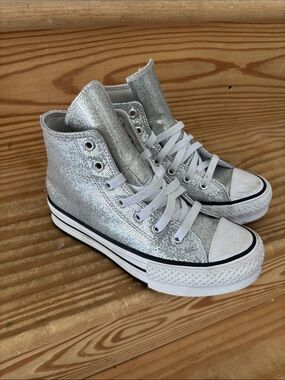 Silver sparkly high top converse